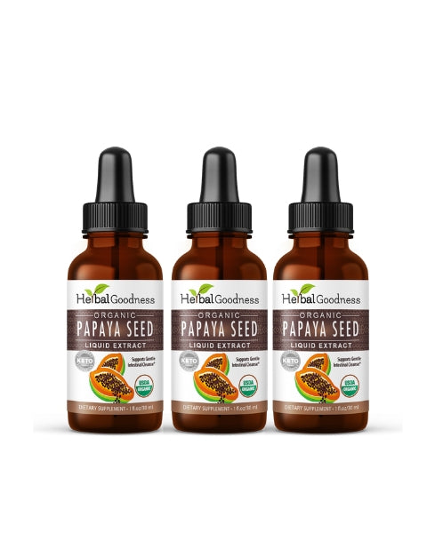 Three amber glass bottles of organic papaya seed extract liquid with black dropper caps for colon and gut cleanse