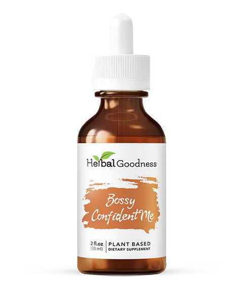 A brown glass dropper bottle of sassy wellness drops with a white cap labeled herbal goodness bossy confident me